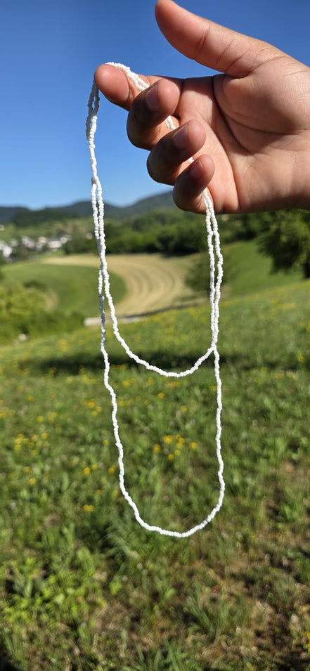 Guia de miçanguinha branca