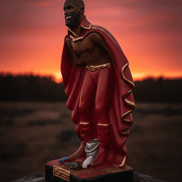 Exu Marabô de lado pôr do sol