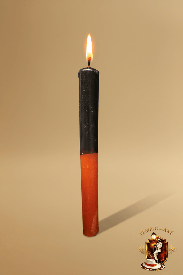 Schwarze und orangefarbene Kerze